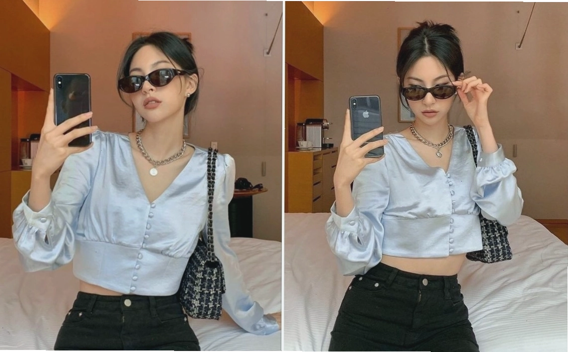 Tạo dáng trước gương trong khách sạn sang trọng